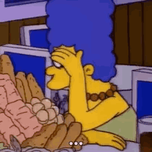 Marge Simpson turns away and covers her face with one hand.