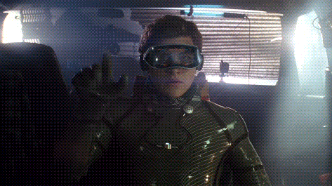 a man in a futuristic suit is wearing a pair of virtual reality glasses