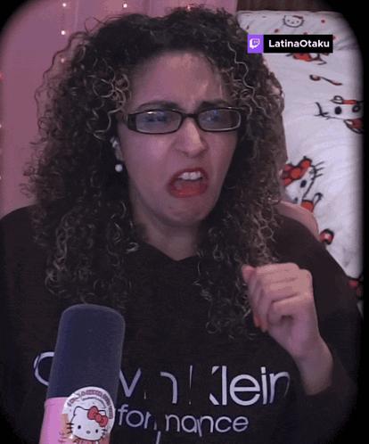 a woman wearing glasses and a black shirt that says calvin klein for nance