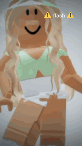 a girl in a green top and white shorts is smiling with a flash sign above her head