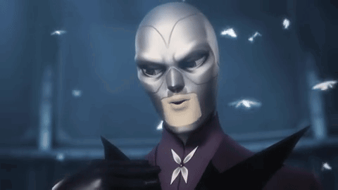 a close up of a cartoon character wearing a mask and a butterfly on his chest .