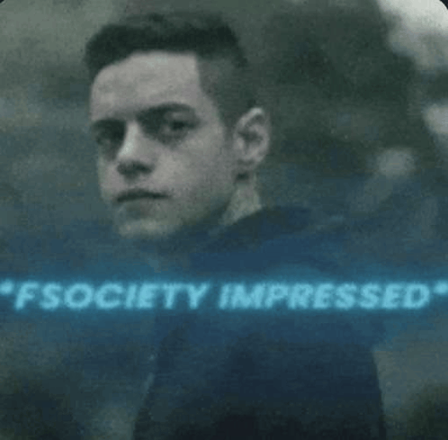 a close up of a man 's face with the words `` fsociety impressed '' written on it .
