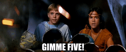 two boys in a cave with the words gimme five on the bottom right