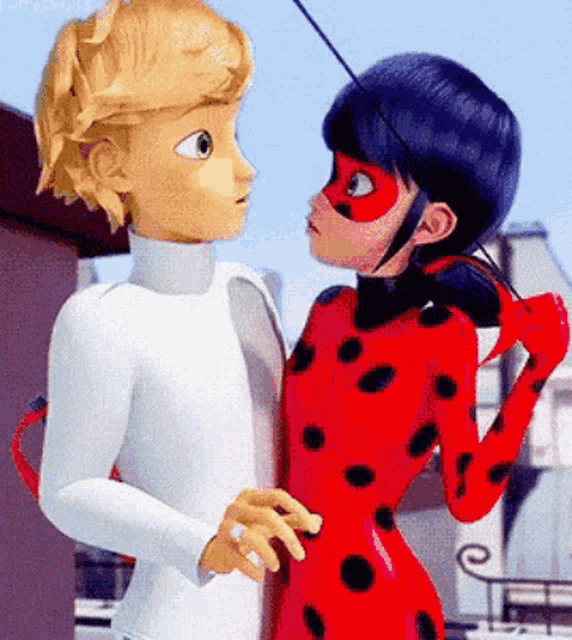 a boy and a ladybug are standing next to each other .