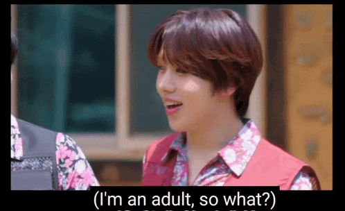 a man in a floral shirt says " i 'm an adult "