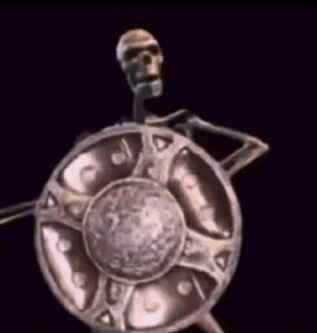 a statue of a skeleton holding a shield and sword
