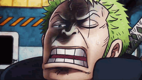 Zoro from One Piece grimaces angrily in an animated close-up.
