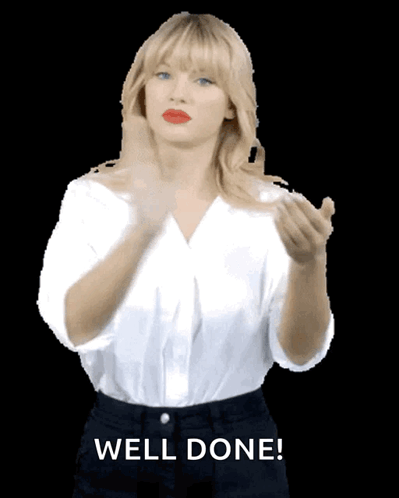 Taylor Swift claps with the caption “WELL DONE!”