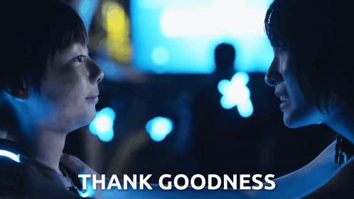 a poster that says thank goodness shows two people looking at each other