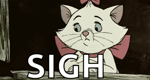 Marie the kitten looks sad with a large “SIGH” caption.