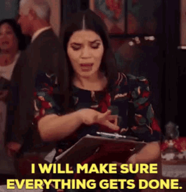 a woman is sitting at a table with a clipboard and a pen and says `` i will make sure everything gets done ''