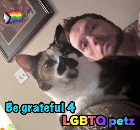 a picture of a man and a cat with the words be grateful 4 lgbtq petz on the bottom