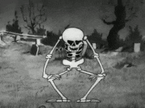A skeleton performs a bent-knee dance in a spooky black-and-white scene.