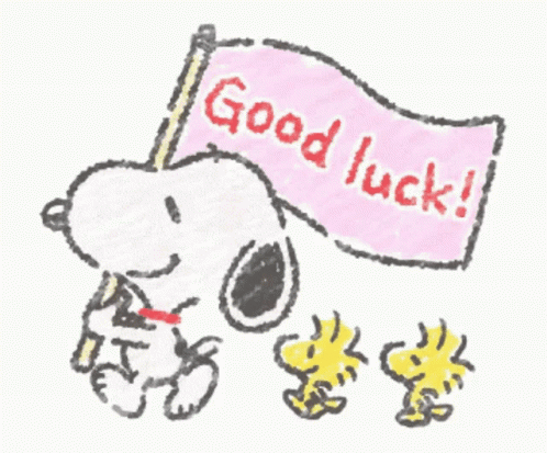 Snoopy holds a “Good luck!” flag while Woodstock marches alongside him.