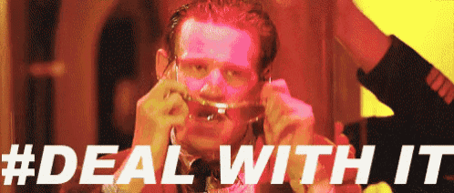 a man is drinking from a glass with the words " deal with it " written above him .