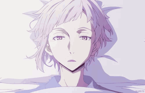 a close up of a person with purple eyes