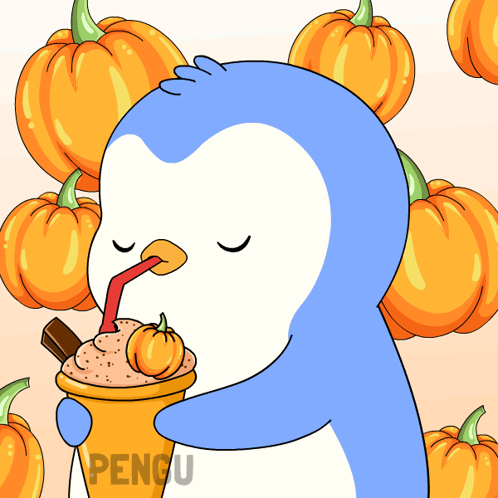 a penguin drinking a milkshake with a pumpkin in it