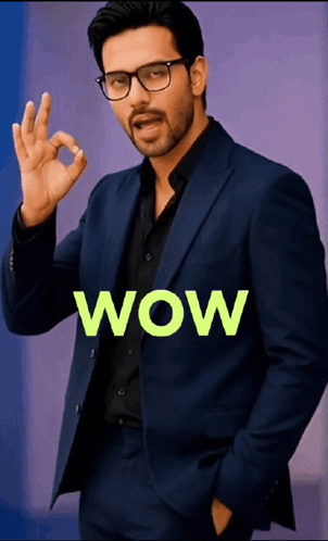 A man in glasses makes an approving hand gesture beside lime green “WOW” text.