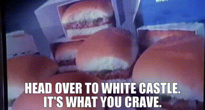 a tv screen shows a hamburger with the words head over to white castle it 's what you crave