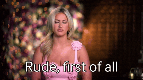 a woman in a pink dress with the words rude first of all above her