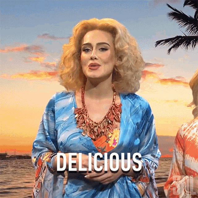 a woman in a blue dress has the word delicious written on her shirt