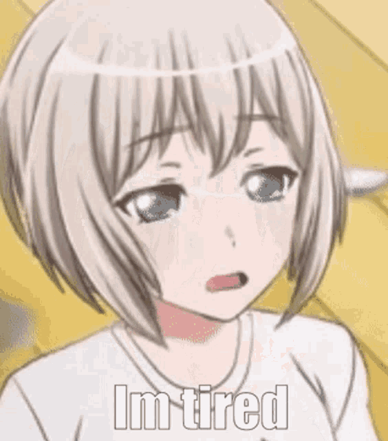 a close up of a anime girl yawning with the words `` i 'm tired '' written on her face .