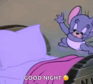 Tom lies in bed with “GOOD NIGHT” text while Jerry peeks nearby.