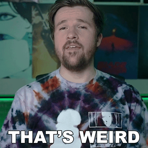 a man wearing a tie dye shirt with the words that 's weird on it