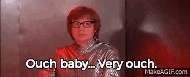 Austin Powers says “Ouch baby... Very ouch” in a red-tinted scene.