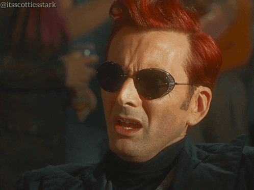 a man with red hair is wearing sunglasses and says " no i 'm just surprised that 's all "