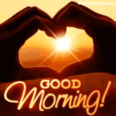 Hands form a heart around a sunrise with “GOOD Morning!” text.