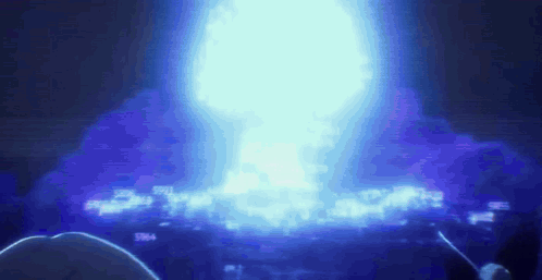 a person is standing in front of a large blue light that is coming out of a hole in the ground .