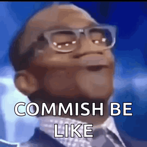 a man wearing glasses and a suit is saying " commish be like "