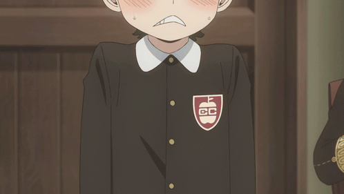 a boy with a badge on his chest that says fc