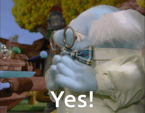 a cartoon character wearing glasses and a bow tie says " yes "