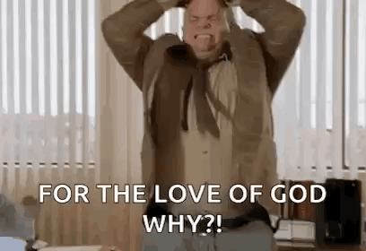 A man in an office grabs his head beneath “FOR THE LOVE OF GOD WHY?!”