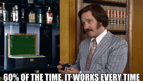 a man in a suit and tie is holding a watch with the words " 60 % of the time it works every time " below him