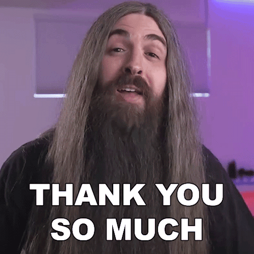 a man with long hair and beard says thank you so much