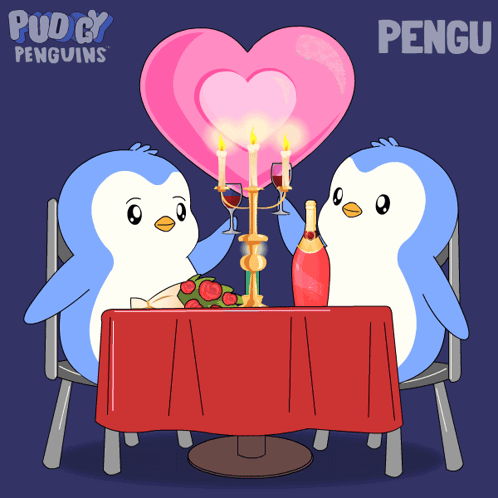 a couple of penguins sitting at a table with candles and a heart shaped candelabra
