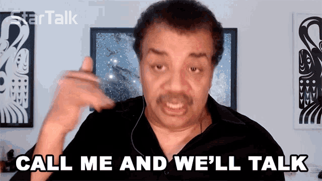 a man says call me and we 'll talk while wearing headphones