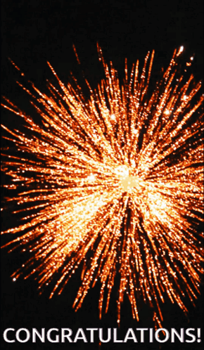 A bright orange firework bursts on black above a small “CONGRATULATIONS!” caption.