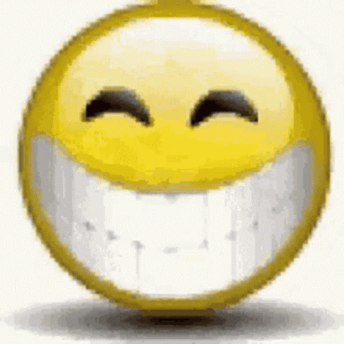 A yellow smiley face gives a huge toothy grin.