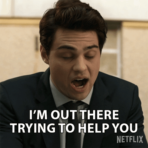 a man in a suit is saying i 'm out there trying to help you