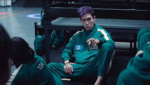 a man with purple hair is wearing a green uniform with the number 280