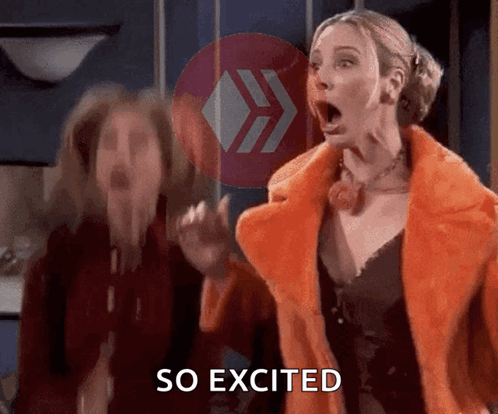 a woman in a fur coat says so excited next to another woman