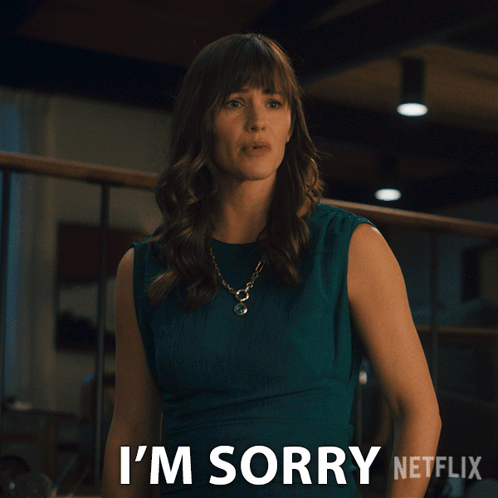 a woman in a blue dress says i 'm sorry netflix
