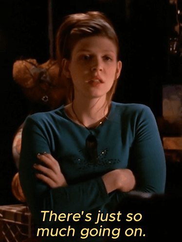 a woman with her arms crossed and the words i 'm really tired below her