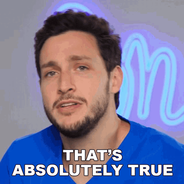 a man with a beard and a blue shirt says that 's absolutely true