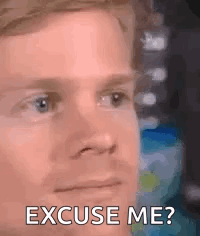 a man is making a funny face and saying `` excuse me ? ''