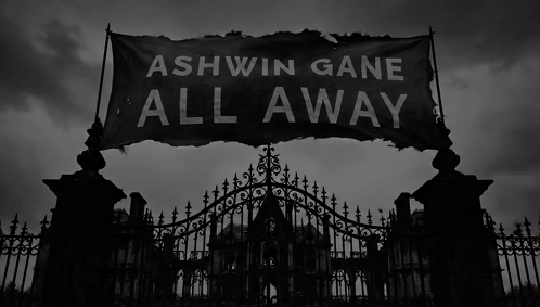 a sign that says ashwin gane all away hangs above a gate